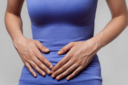 abdominal pain with worms in the body